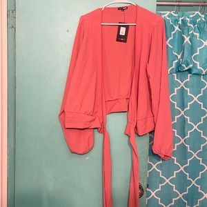 Low cut  coral wrap linen shirt with with belt that can tie side front or back